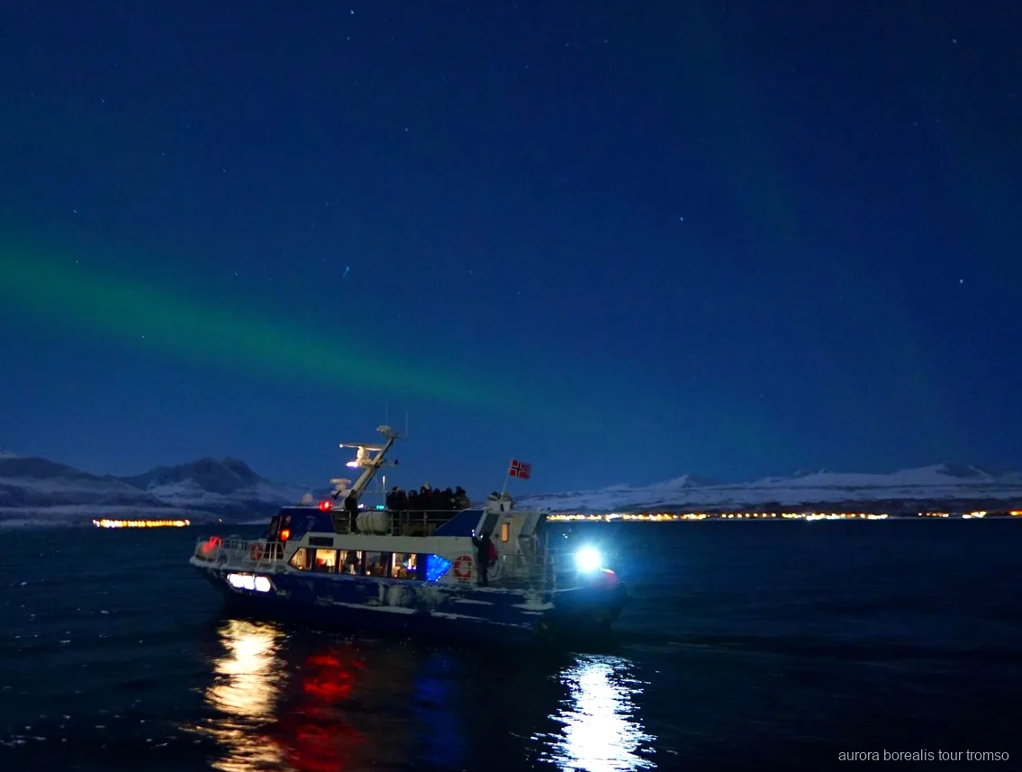 Boat used on the Tromso evening aurora cruise departing the city dock